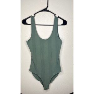 Womens Body Suit. One piece. Color Green. Size L.